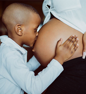 Child Kissing Belly