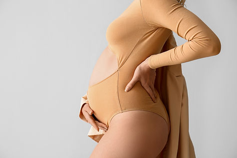 Pregnant Woman in Beige