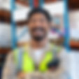 Smiling Worker in Warehouse