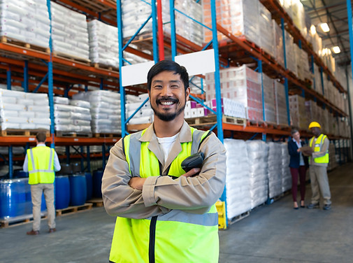 Smiling Worker in Warehouse
