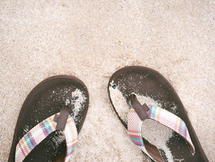 Sandals on a beach.
