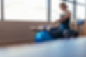 Instructor Assisting with Exercise