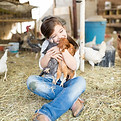 Girl Hugging Chicken