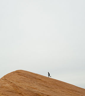 Person Running Uphill