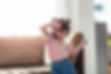 Cute little girl doing a happy dance.