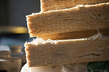 Stack of mineral wool for energy insulation of buildings stored at a construction site