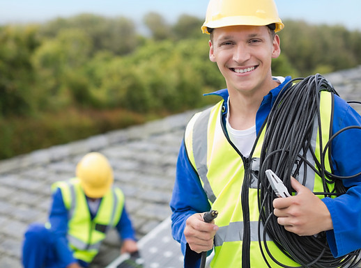 Worker smiling on rooftop