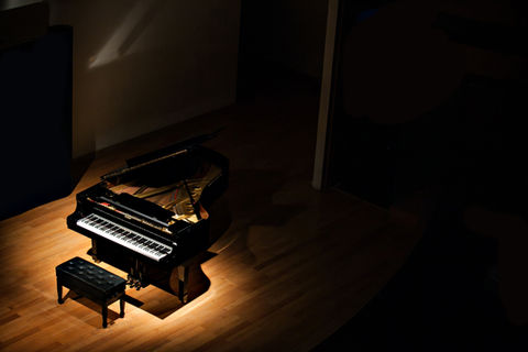 Piano on Dim Stage