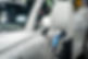 EV Car or Electric vehicle at charging station with the power cable supply plugged in on b