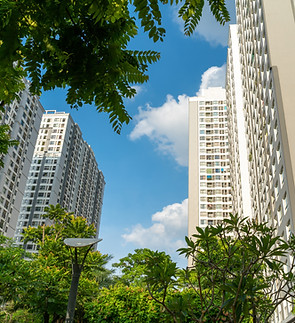 Modern condominium building with trees