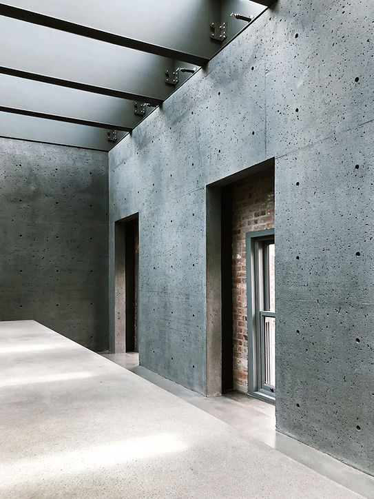 Smooth concrete interior wall installed by Tyeco Services, showcasing durable and high-quality concrete work for residential and commercial spaces in Vancouver, WA & Portland, OR
