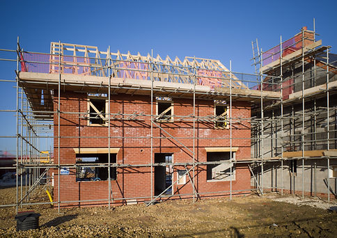 New build house under construction with scaffolding