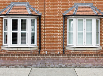 Modern bay windows on adjoining town houses