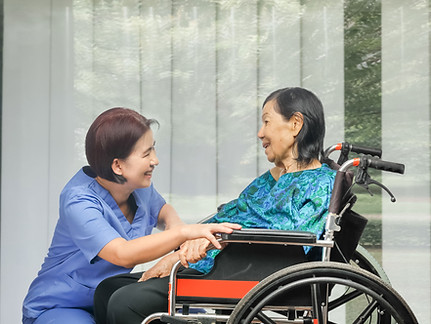 Nurse and Patient on Wheelchair