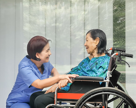 Nurse and Patient on Wheelchair
