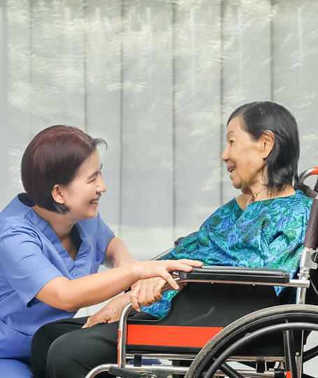 Nurse and Patient on Wheelchair