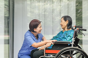 Nurse and Patient on Wheelchair