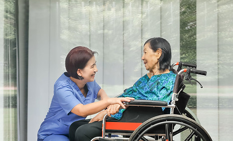 Nurse and Patient on Wheelchair