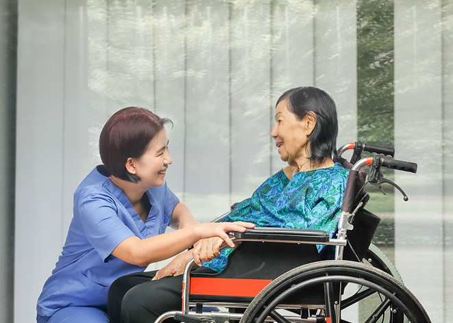 Nurse and Patient on Wheelchair