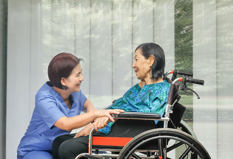 Nurse and Patient on Wheelchair