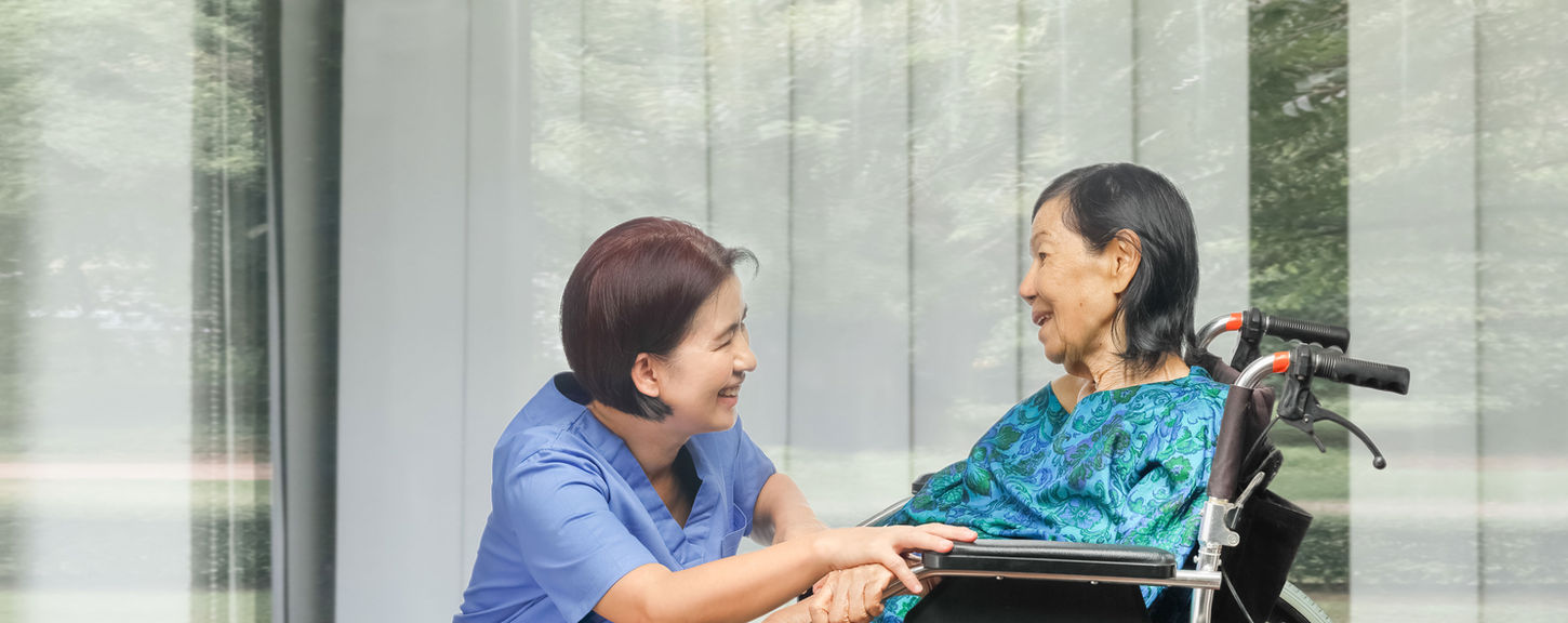 Nurse and Patient on Wheelchair