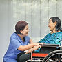 Nurse and Patient on Wheelchair