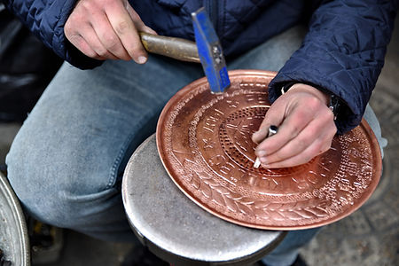 Coppersmith at Work