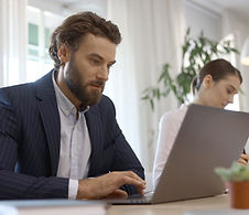 Businessman Using Laptop