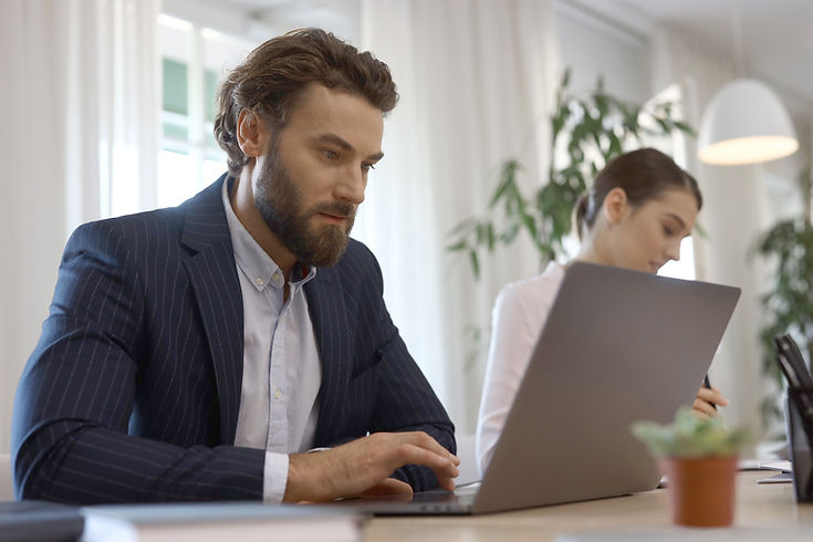 Businessman Using Laptop
