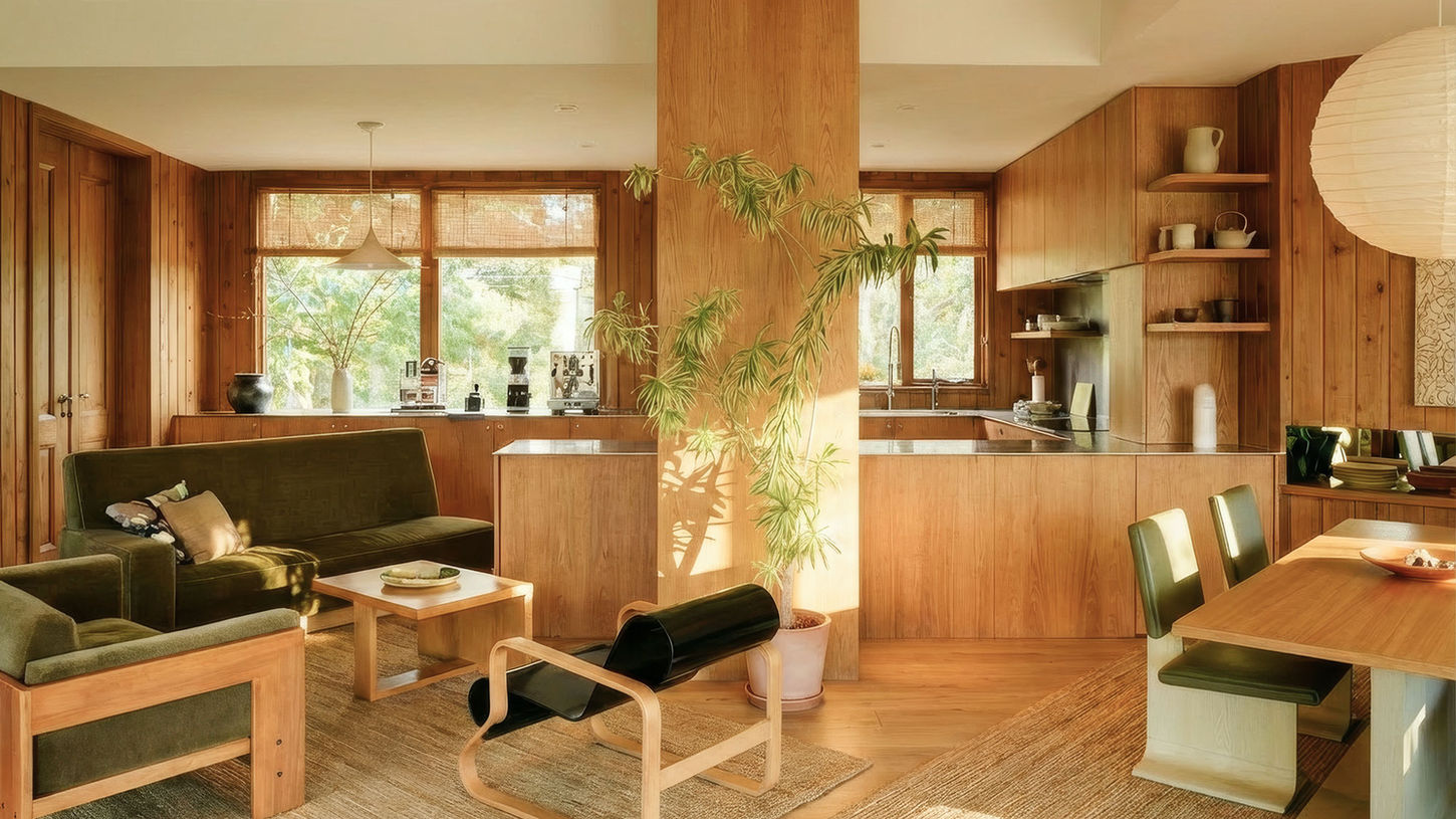 Modern wood-paneled living space with mid-century furniture