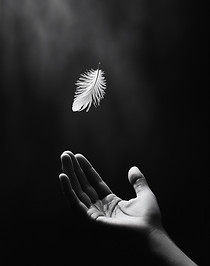 Hand und fallende Feder