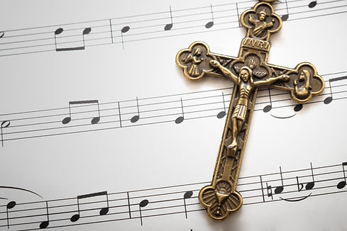 Music Sheets and a Cross