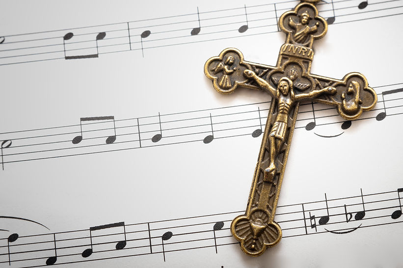 Music Sheets and a Cross