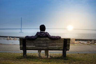 海辺で眺める夕日