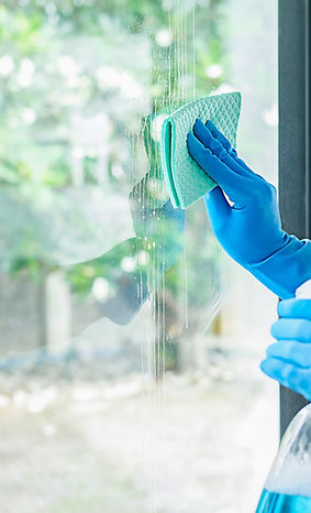 Cleaning Service concept. Cleaners employee removing dirt with equipment in office