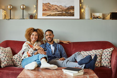 Young couple relaxing on a sofa