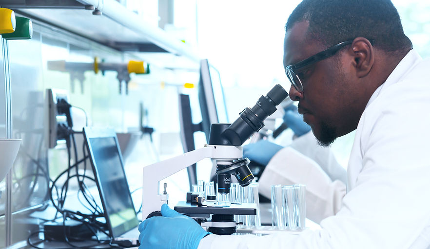 Modern clinical trial facility with researchers conducting FDA/EMA-compliant studies at Nivella Health in Rwanda.