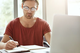 Man Studying At Desk