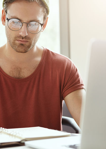 Man Studying At Desk