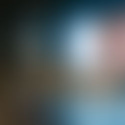 Night city scene with blurred people walking. A large billboard displays a close-up of a woman's face with the text "LASH" on it.