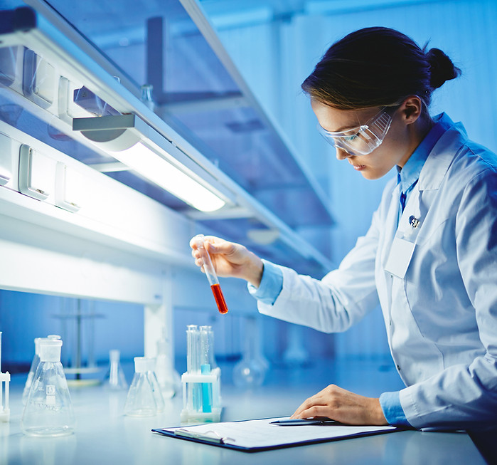 Scientist with Test Tubes