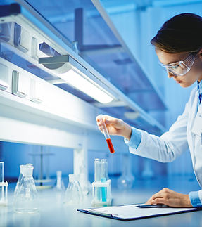 Scientist with Test Tubes