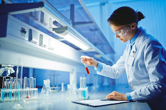 Scientist with Test Tubes