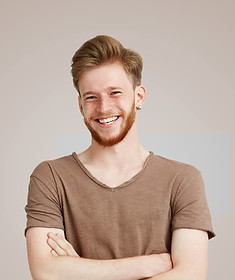 Smiling in Brown Shirt