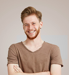 Smiling in Brown Shirt