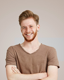 Smiling in Brown Shirt