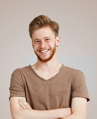 Smiling in Brown Shirt