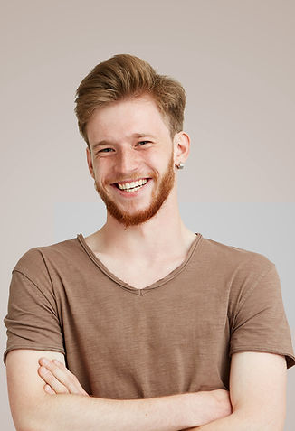Smiling in Brown Shirt