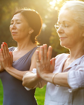 Women Practicing Yoga Outdoor