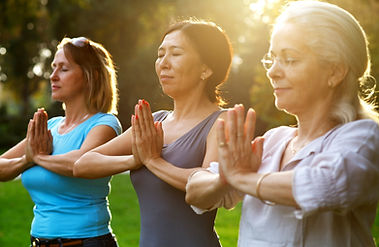 Women Practicing Yoga Outdoor